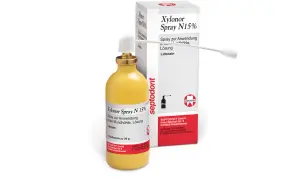 Flacone giallo con spray Xylonor N15% e scatola, per uso orale.