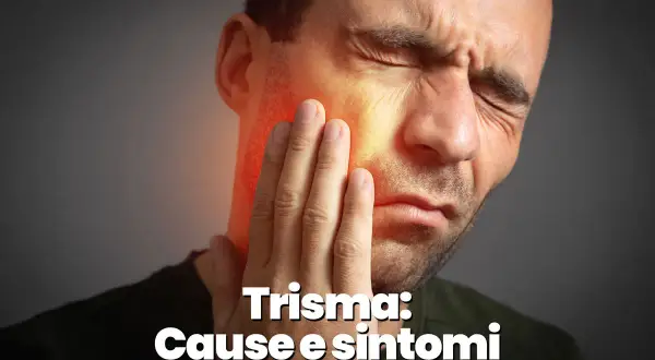 Uomo con mano sulla guancia, evidenziando il dolore alla mascella e le sue cause.