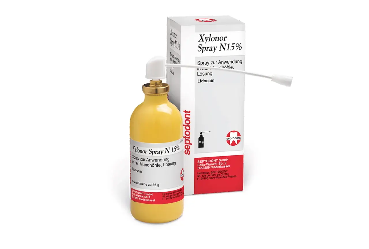 Flacone giallo con spray Xylonor N15% e scatola, per uso orale.